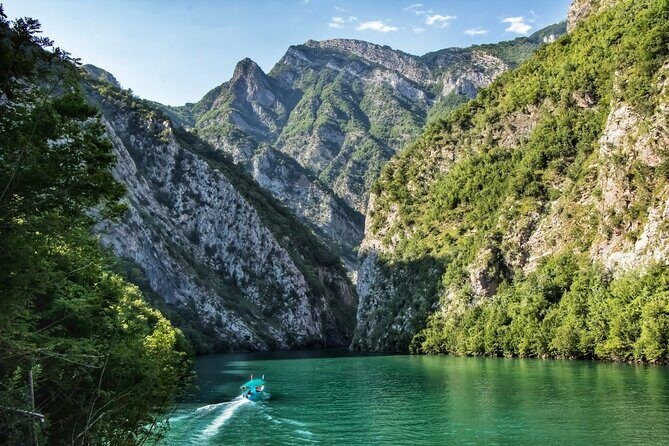 From Tirana/Durrës: Day Trip to Shala River and Koman Lake - Koman Lake and the Komani Dam: the boat transfer that makes it work