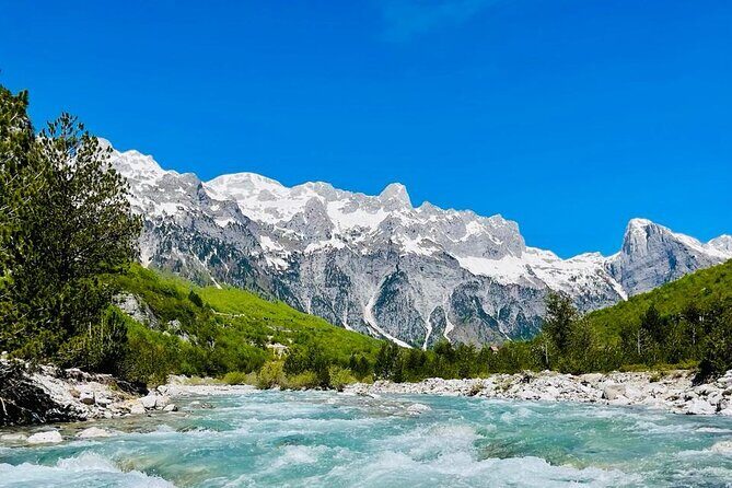 Full Day Tour to Albanian Alps Theth, Grunas Waterfall, Blue Eye - Nderlysaj natural baths: the short downhill moment