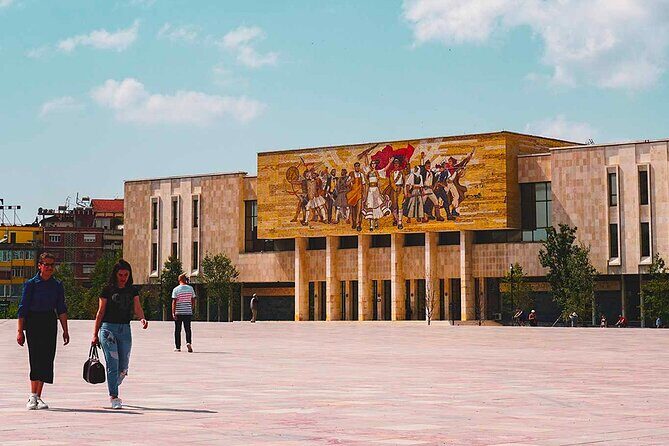 Tirana Express Walking Tour - Essential of the Albanian Capital - Deshmoret e Kombit Boulevard and Mother Teresa Square: Where the city performs